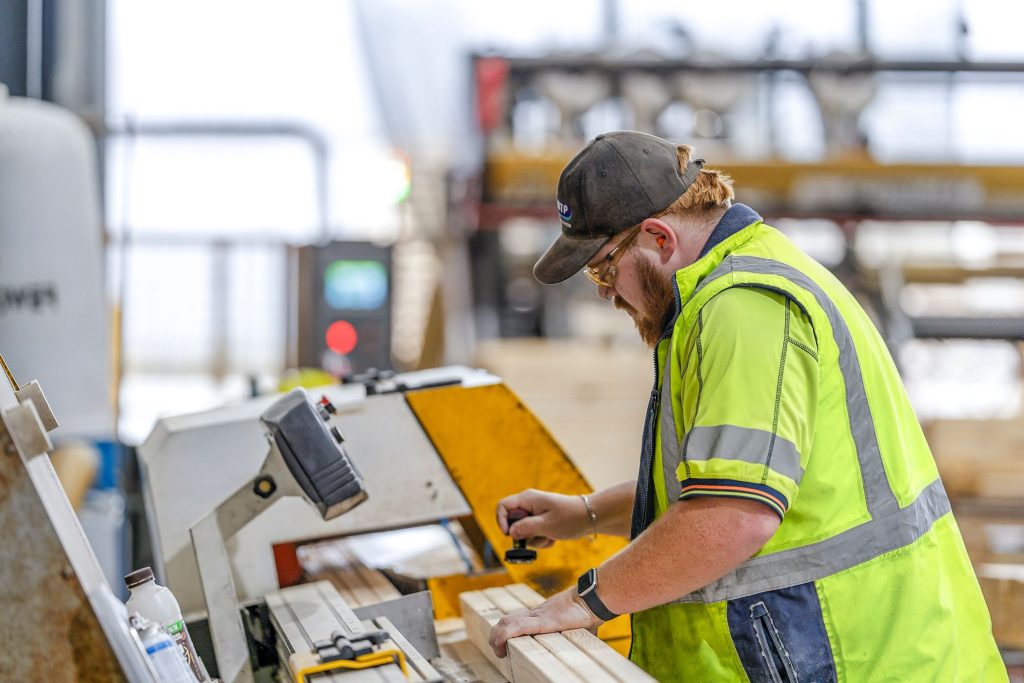 Factory worker on the production floor at CMTP Albury, NSW