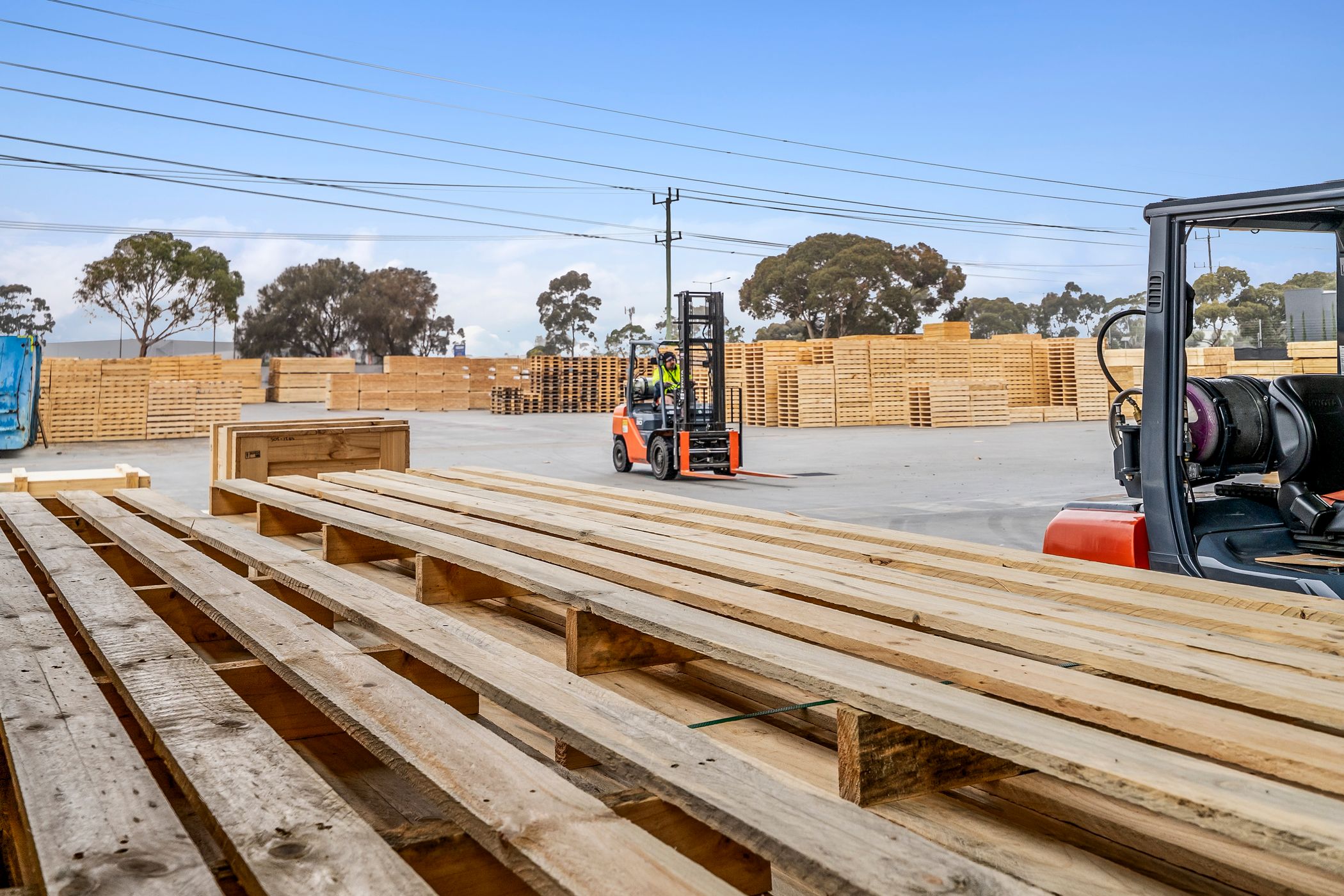 CMTP forklift driver driving out of the warehouse into the yard