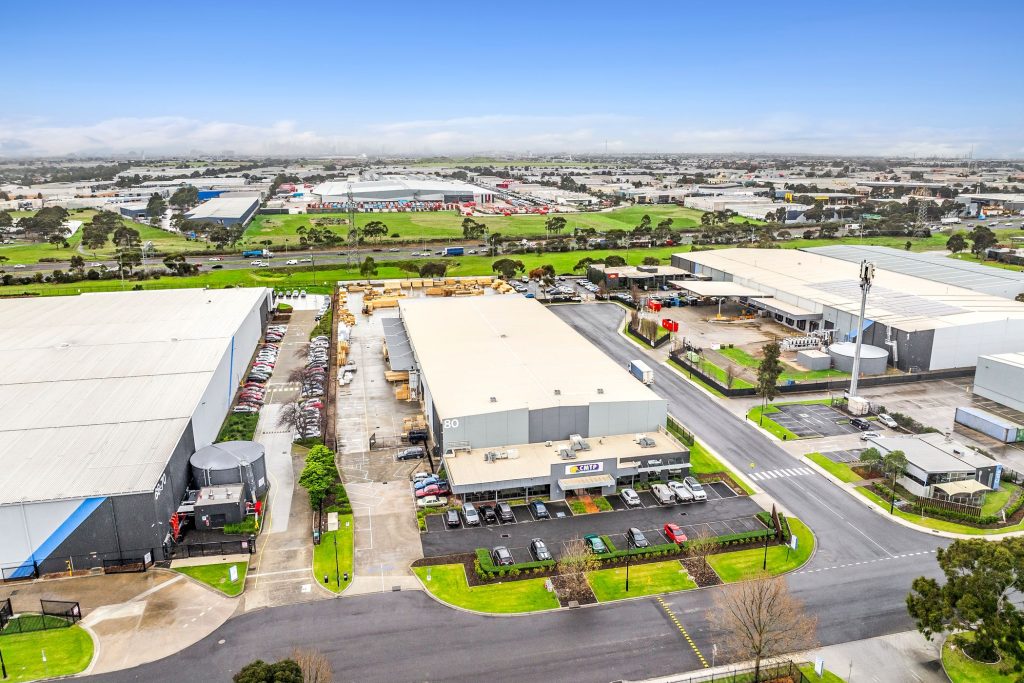 Overhead view of the CMTP Derrimut site showing the factory roof, loading area and pallet stock in Melbourne's west