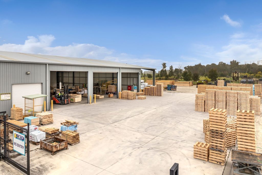 Timber produce bins stacked at the CMTP Albury site on the NSW and Victorian border