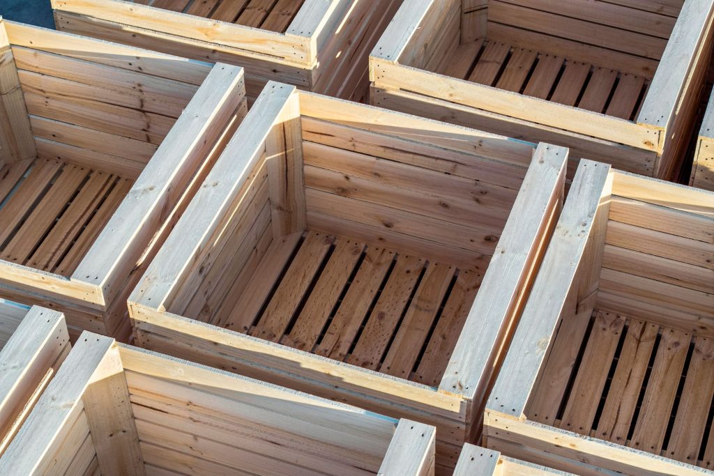 Timber produce bins stacked at the CMTP Mildura site in Sunraysia